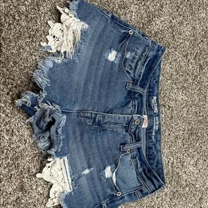 Mossimo Supply Co. Distressed Blue Jean Shorts with Crochet Detail